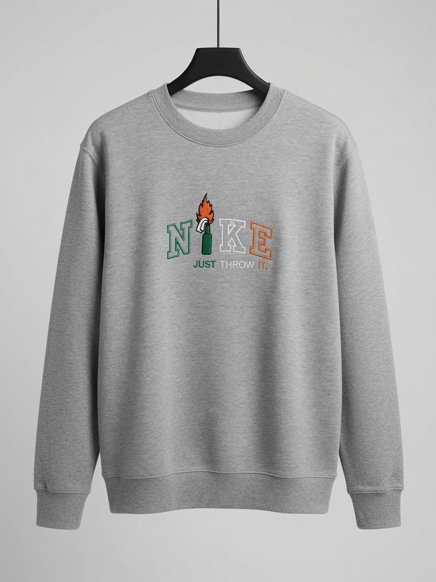 Close-up of Just Throw It embroidery on sweatshirt